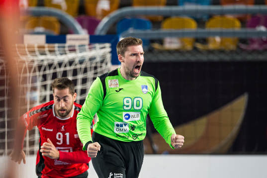 Goalkeeper Urban Lesjak of Slovenia celebrates