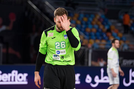 Goalkeeper Klemen Ferlin of Slovenia looks dejected