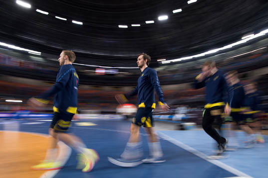 Hampus Wanne of Sweden enters the arena with team mates