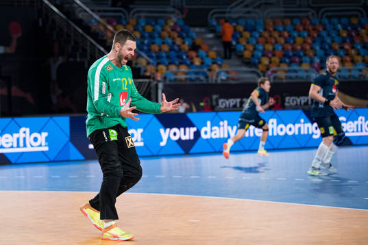 Goalkeeper Andreas Palicka of Sweden celebrates