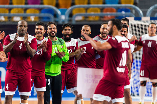 Players of Qatar celebrate