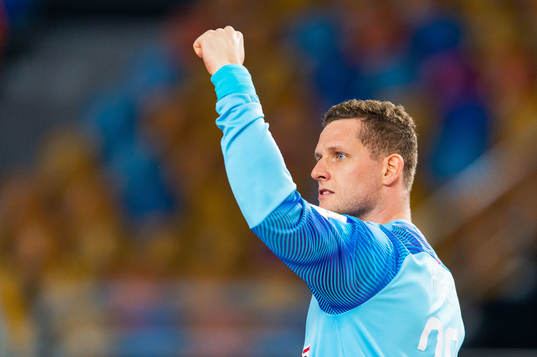 Goalkeeper Kevin Møller of Denmark celebrates