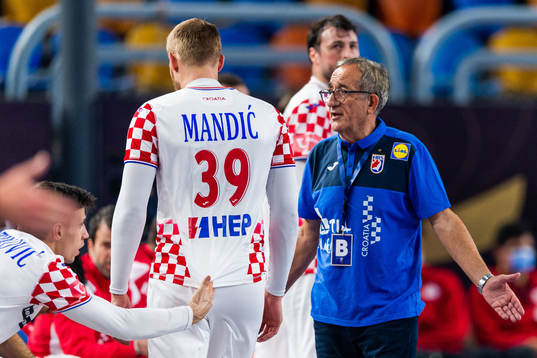 Lino Cervar, head coach of Croatia reacts towards David