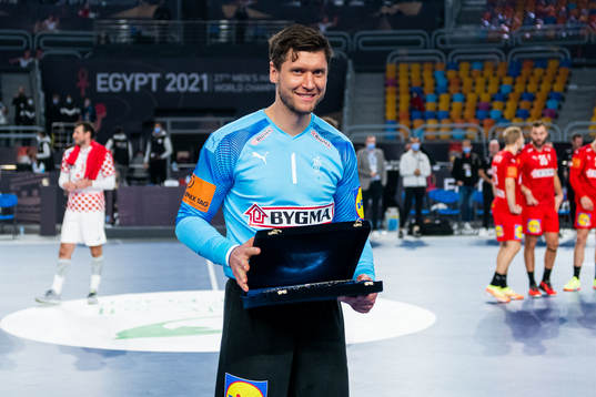 Goalkeeper Niklas Landin Jacobsen of Denmark receives the