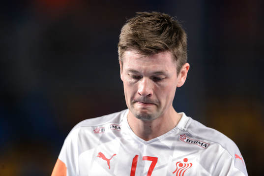 Lasse J. Svan of Denmark looks dejected