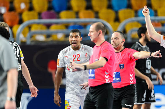 Mads Larsen Mensah of Denmark reacts