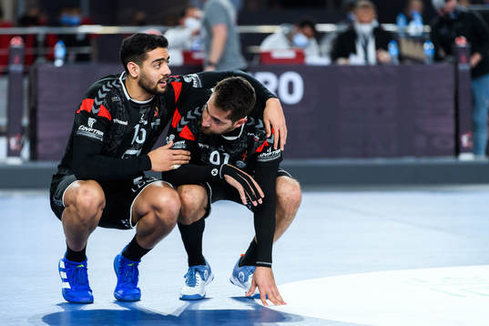 Ahmed Hesham and Mohammad Sanad of Egypt look dejected
