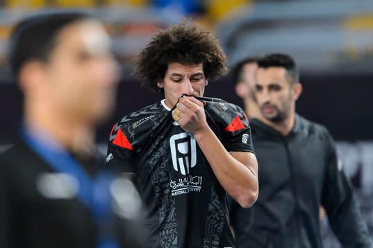 Ali Zein of Egypt looks dejected