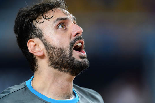 Goalkeeper Mohamed Abidi of Qatar celebrates