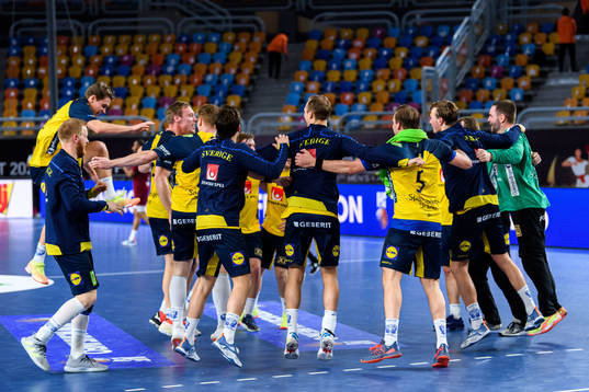 Players of Sweden celebrate
