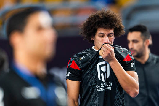 Ali Zein of Egypt looks dejected