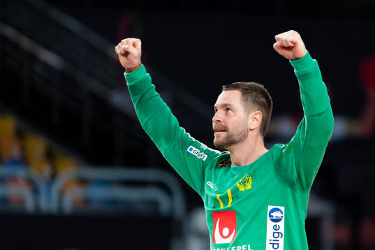 Goalkeeper Andreas Palicka of Sweden celebrates