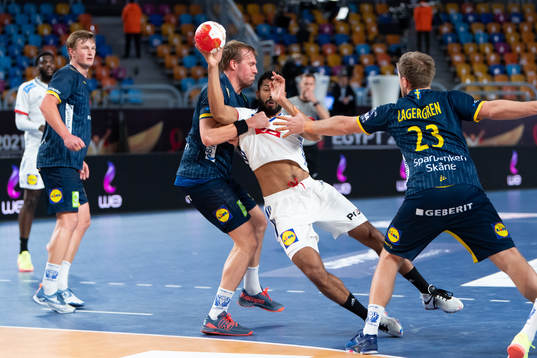 Max Darj of Sweden defends against Nicolas Claire of France