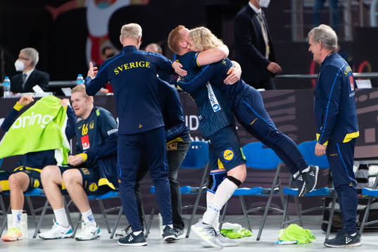 Jim Gottfridsson of Sweden celebrates with physio Johanna