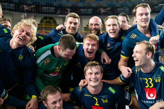 The Swedish players celebrate