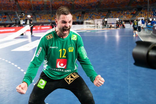 Goalkeeper Andreas Palicka of Sweden celebrates