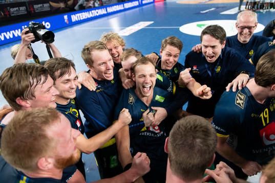 The Swedish players celebrate