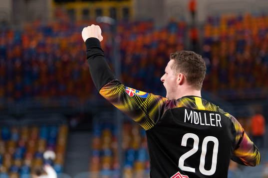 Goalkeeper Kevin Møller of Denmark celebrates