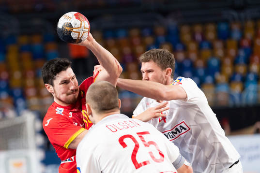 Alex Dujshebaev of Spain against Morten Toft Olsen and