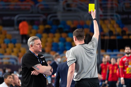Nikolaj Jacobsen, head coach of Denmark is shown a yellow
