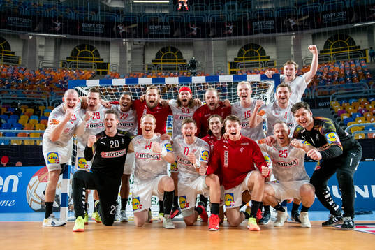 The Danish players celebrate