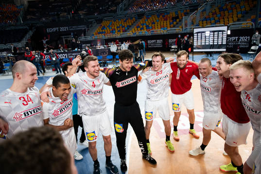 The Danish players celebrate