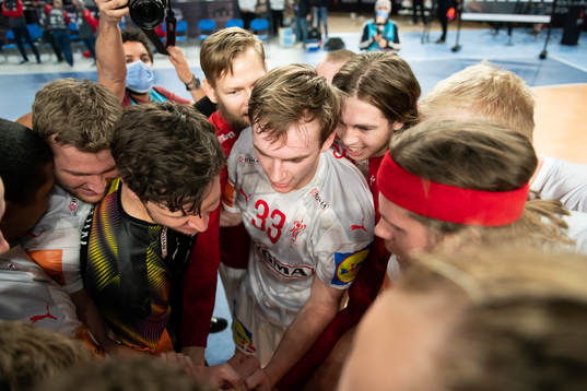 The Danish players celebrate