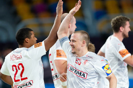 The Danish players celebrate