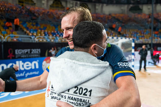 Max Darj of Sweden hugs the team guide Omar Elwardany