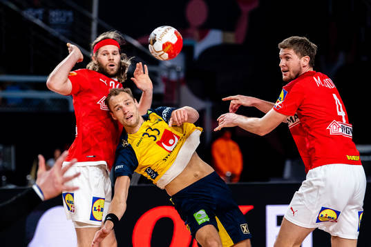 Mikkel Hansen Magnus Landin Jacobsen of Denmark and Lukas