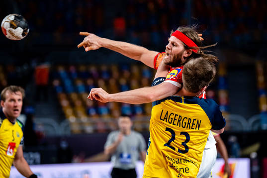 Mikkel Hansen of Denmark and Albin Lagergren of Sweden