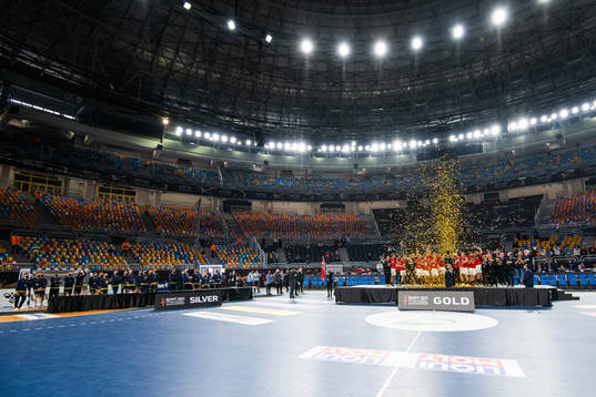 Players of Sweden look dejected while players of Denmark