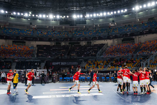 Jim Gottfridsson of Sweden looks dejected while players of