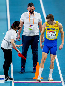 Jesper Hellström of Sweden talks to the referees in men's