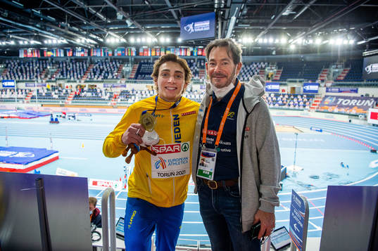 Armand Duplantis of Sweden and Greg Duplantis with the gold