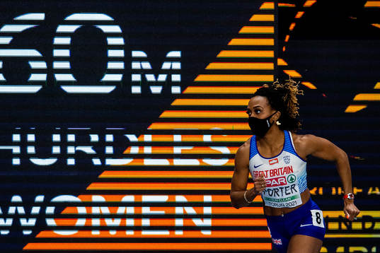 Tiffany Porter of Great Britain wears a face mask