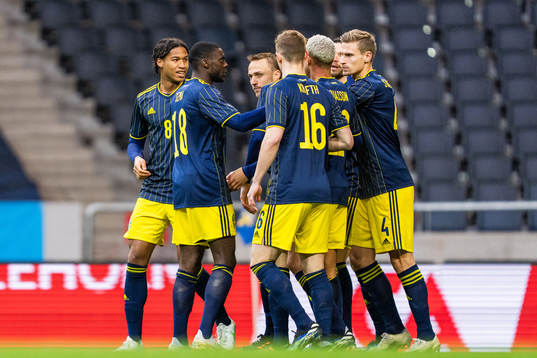 Marcus Berg of Sweden celebrates with team mates