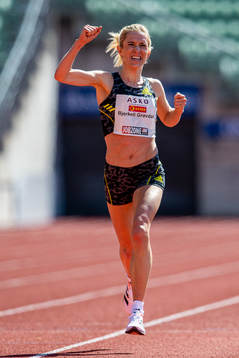 Karoline Bjerkeli Grøvdal of Norway celebrates in the