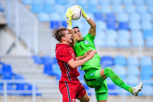 Kristian Thorstvedt of Norway and goalkeeper Odisseas