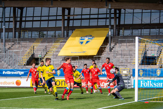 Emil Holm of Sweden scores 1-0