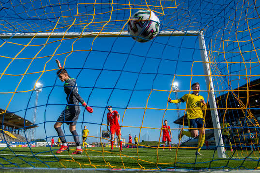 Patrik Wålemark of Sweden scores 6-0 behind goalkeeper