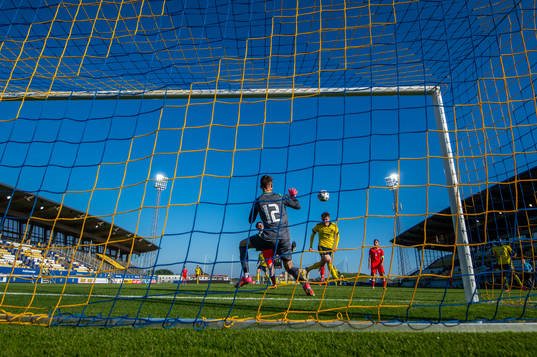 Patrik Wålemark of Sweden scores 6-0 behind goalkeeper