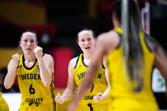 Frida Eldebrink and Elin Eldebrink of Sweden celebrate