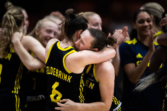 Elin Eldebrink  and Frida Eldebrink  of Sweden celebrates