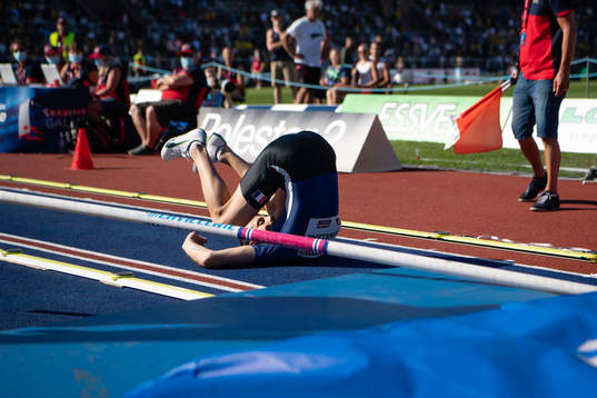 Renaud Lavillenie of France falls outside of the mat