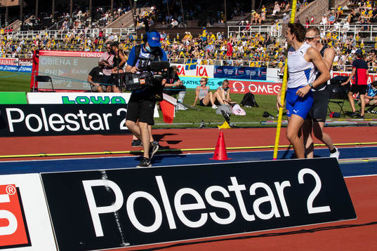 Armand Duplantis of Sweden between Polestar signs