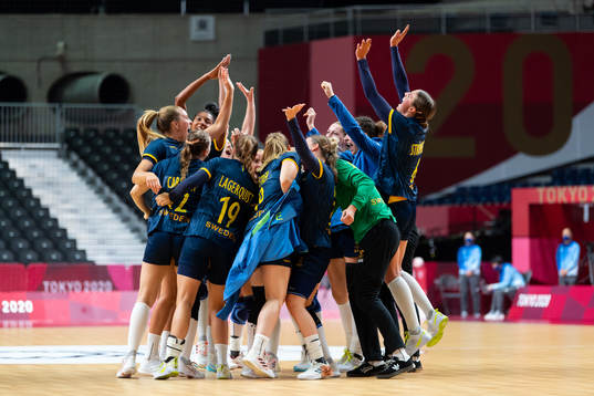 The Swedish players celebrate