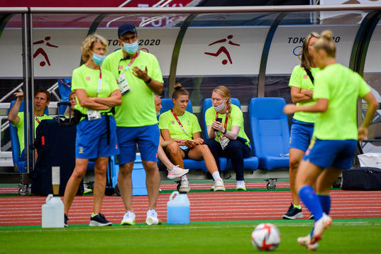 Fridolina Rolfö and goalkeeper Hedvig Lindahl of Sweden