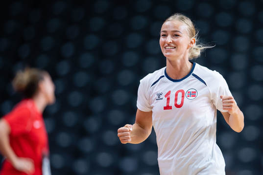 Stine Bredal Oftedal of Norway celebrates while  competing