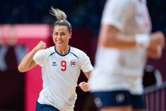 Nora Mørk of Norway celebrates while competing in the